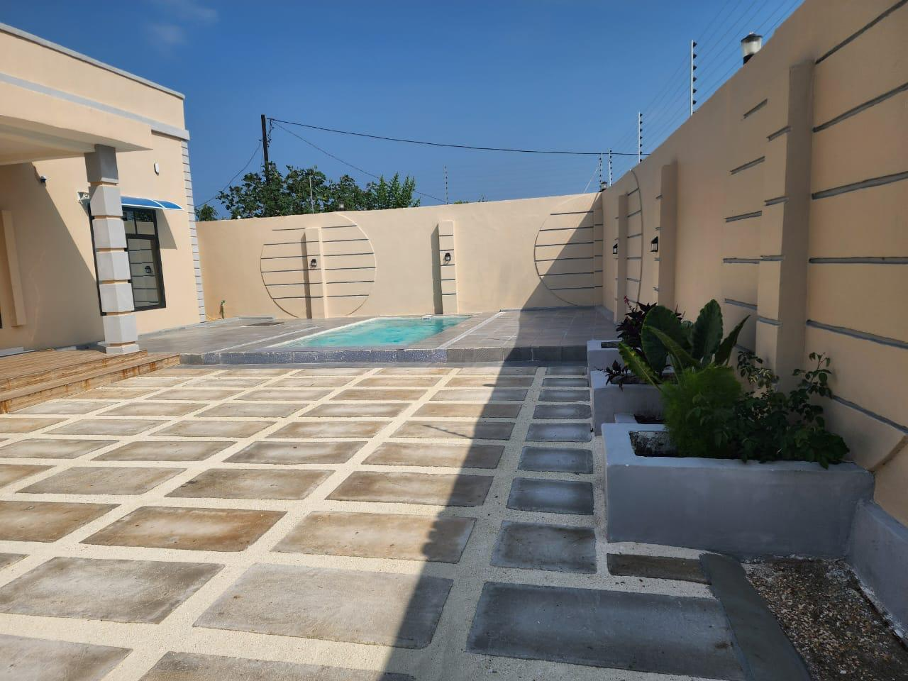 Courtyard terrace beside the jacuzzi pool