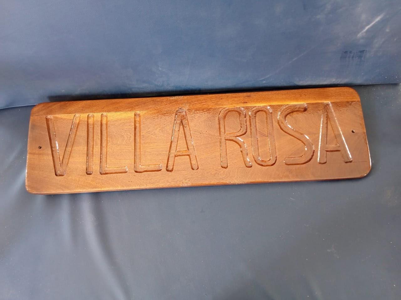 Hand-carved Villa Rosa sign